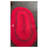 Red braided rug 53inch by 30inch