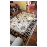 Cream decorative area rug 93 by 126"