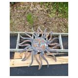 Metal sun hanging