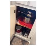 Lot of cleaning supplies and kitchen items