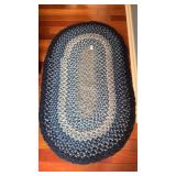 Blue braided rug 58inch by 35inch
