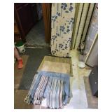 Assortment of rugs and iron board