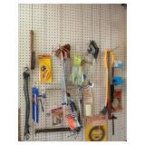 Misc and tools on pegboard lot