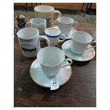 Lot of coffee cups and cup and saucers