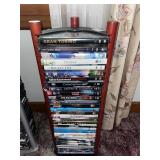 Lot of DVDS- variety with stand