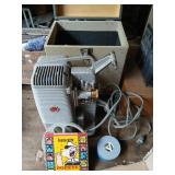 Vintage DeJUR reel player with Popeye film