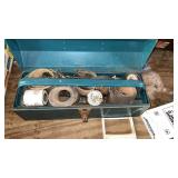 Metal Toolbox with sandpaper and other contents