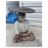 Cement sundial Buddha statue