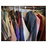 Assortment of clothes and shoes in closet