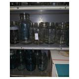 2 shelves of canning jars, crock pot contents