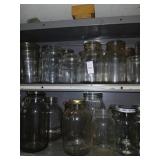 2 shelves of canning jars contents only