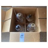 Four glass votive cups