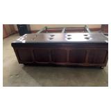 Vintage MCM cedar storage bench with a tufted