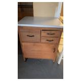 Vintage wood kitchen cabinet with enamel top and