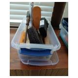 Bin of brushes, timer etc