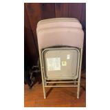 4 beige fabric padded folding chairs