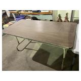 Folding table with metal base