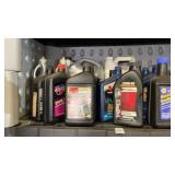 Shelf lot of assorted oil