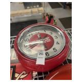 Vintage-style red Coca-Cola metal wall clock.