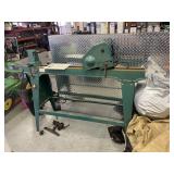 Grizzly wood lathe on a metal stand