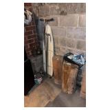 Corner lot of Wood, Glass Bottles, Ironing board,