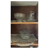 Assortment of glassware plates, bowls, and
