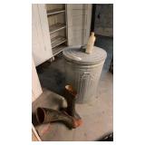 Boots and Metal Trash Can