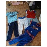 Lot of local baseball uniforms