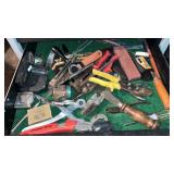 Drawer of assorted snips, tape measures, etc.