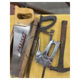 Various tools-hand saw, hacksaw, staple gun and