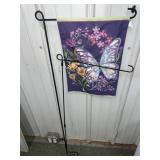 2 garden flag holders with 1 flag