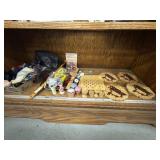 Shelf lot of collectibles, trivets, etc
