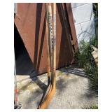 Lot of Wooden Hockey Sticks