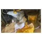 Shelf lot of vintage cylindrical gold-colored