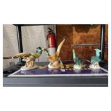 Peacock and Dinosaur Statues