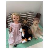 Two Dolls and Two Stuffed Animals
