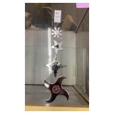 4 silver throwing stars