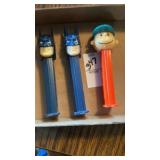 Pez dispensers Batman and Charlie Brown