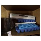 Ice cube trays, wraptastic , and glass mugs