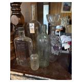 Glass bottles and decanter