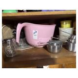 Measuring cups and mixing bowl