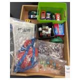 Lot of marbles, dice, cars, etc