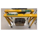2 pro adjustable sawhorses and box of clipboards