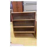 Wooden mobile library features angled pegboard