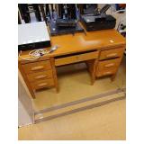 Wooden desk 54"x30" no contents