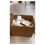 Box of shin guards for soccer or field hockey