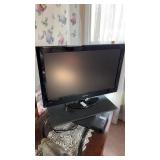 Hisense 24inch flat screen TV with remotes and