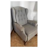 Traditional button-tufted wingback armchair