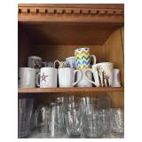 Two Shelf Lots of Assorted Mugs and Glasses