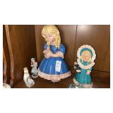 4 children figurines and small basket